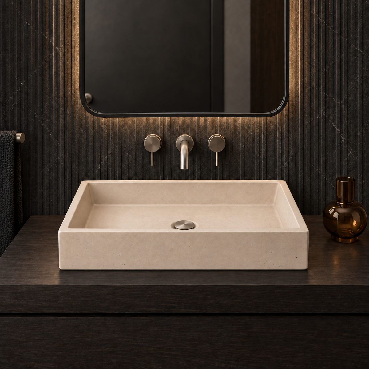 Bribri Hueso concrete vessel sink in a high-end bathroom with brushed nickel drain hardware